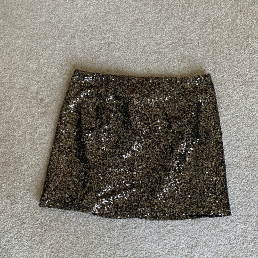 Gold glitter mini skirt.